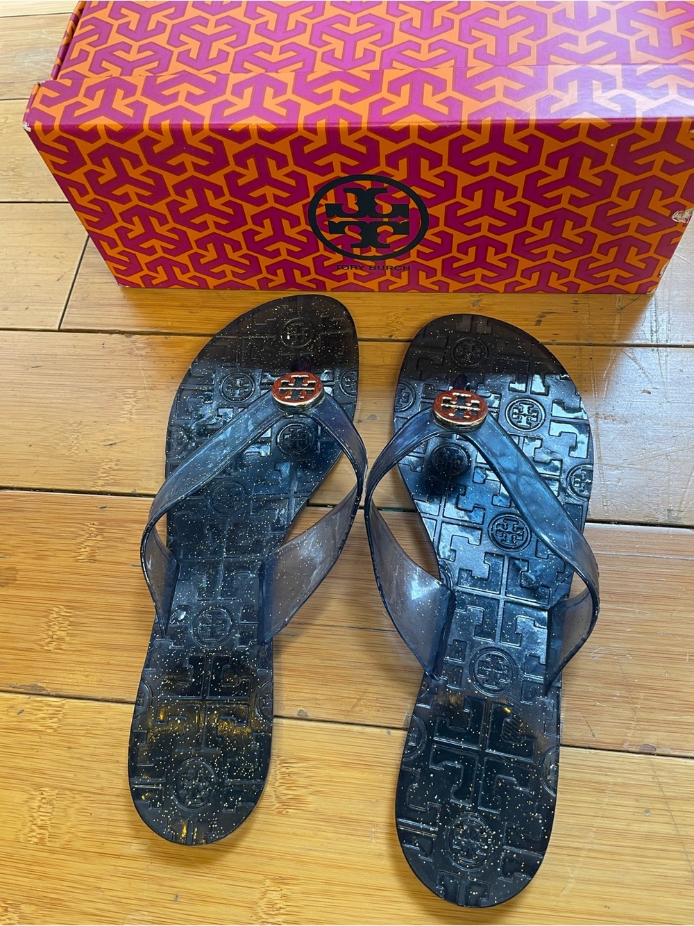 Tory Burch Blue Jelly Flip Flops with Logo Medallion